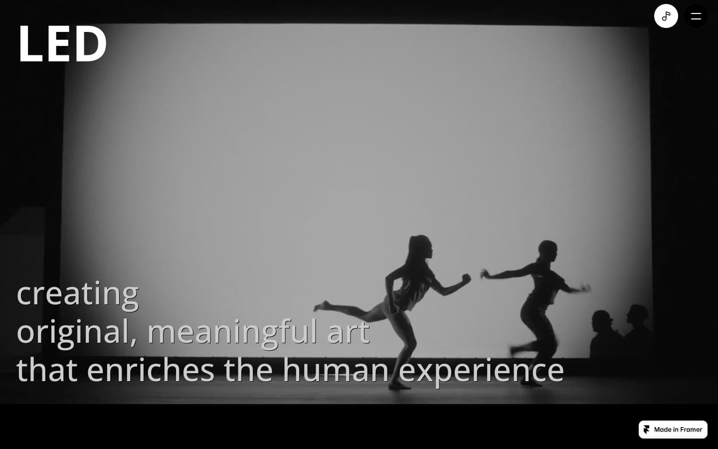 LED site hero — a black and white film still of two dancers over the line 'creating original, meaningful art that enriches the human experience'