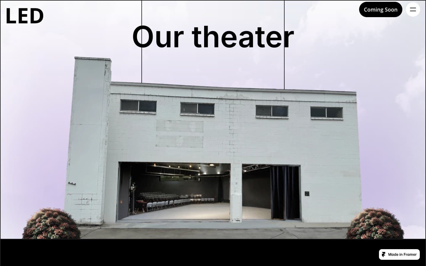 'Our space' page mid-hover — the building's doors open to reveal the black-box theater under a purple sky